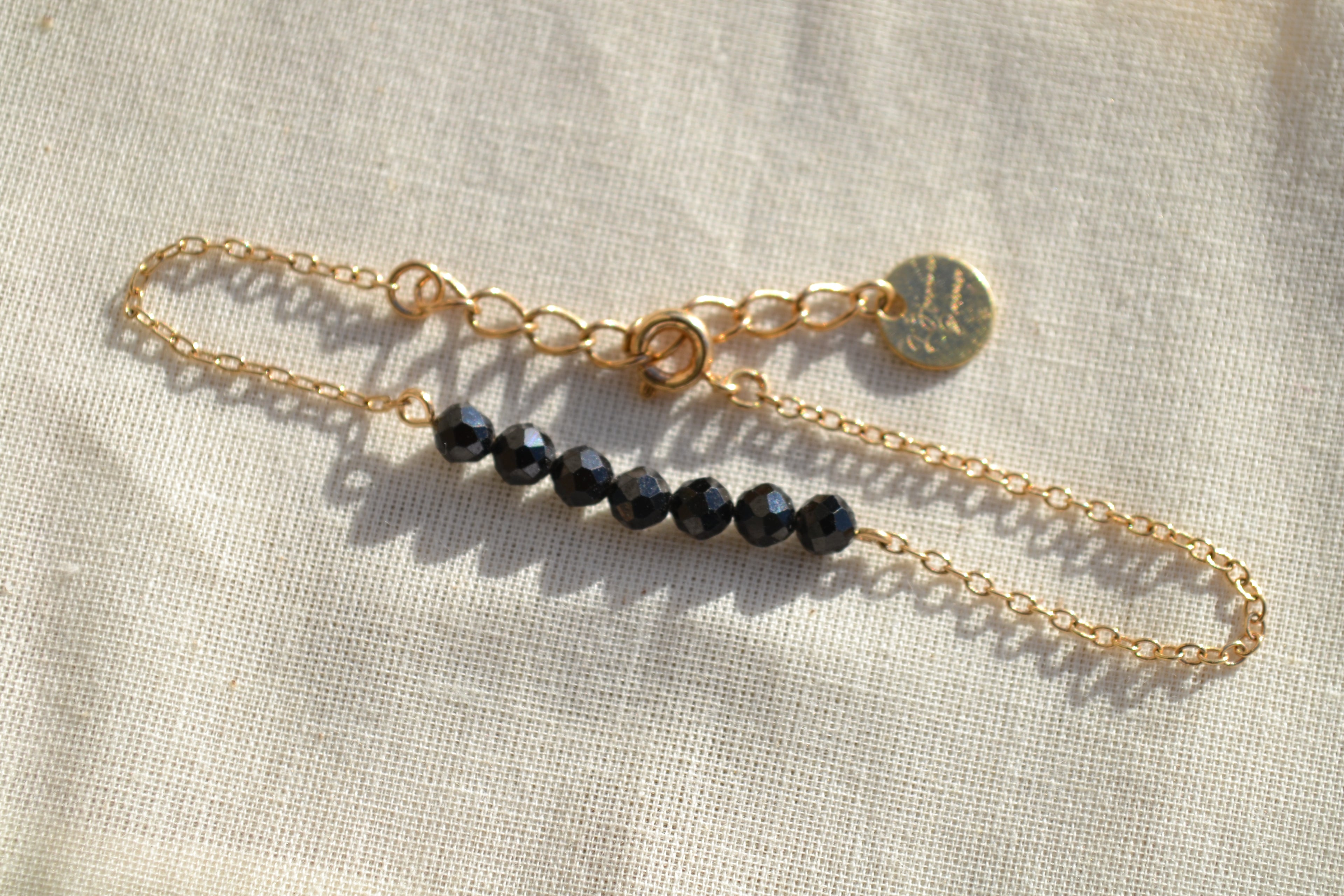 TALISMAN KAÏANOX – Spinelle Noire bracelet 7 gemmes